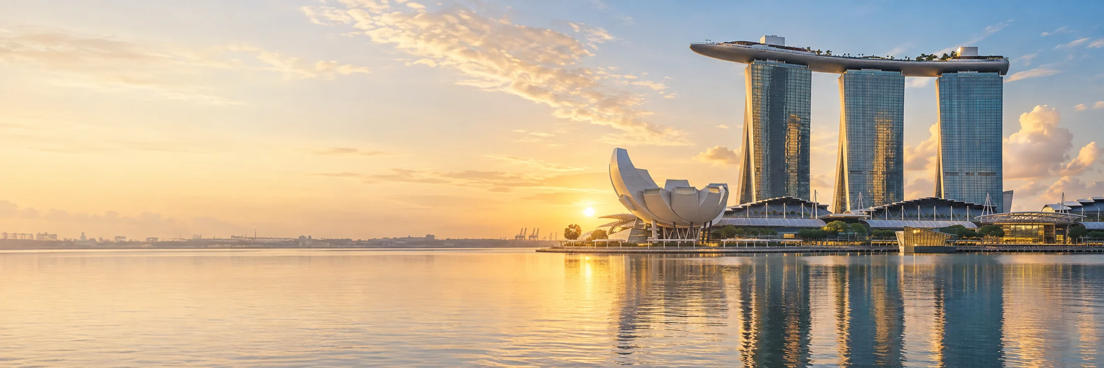Illustrative golden morning view of Marina Bay Sands and the ArtScience Museum across Singapore’s waterfront